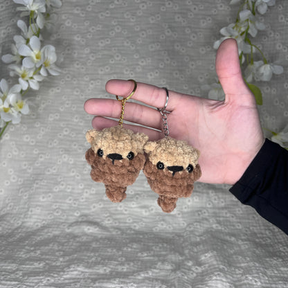 Porte clés argent et or loutre en crochet